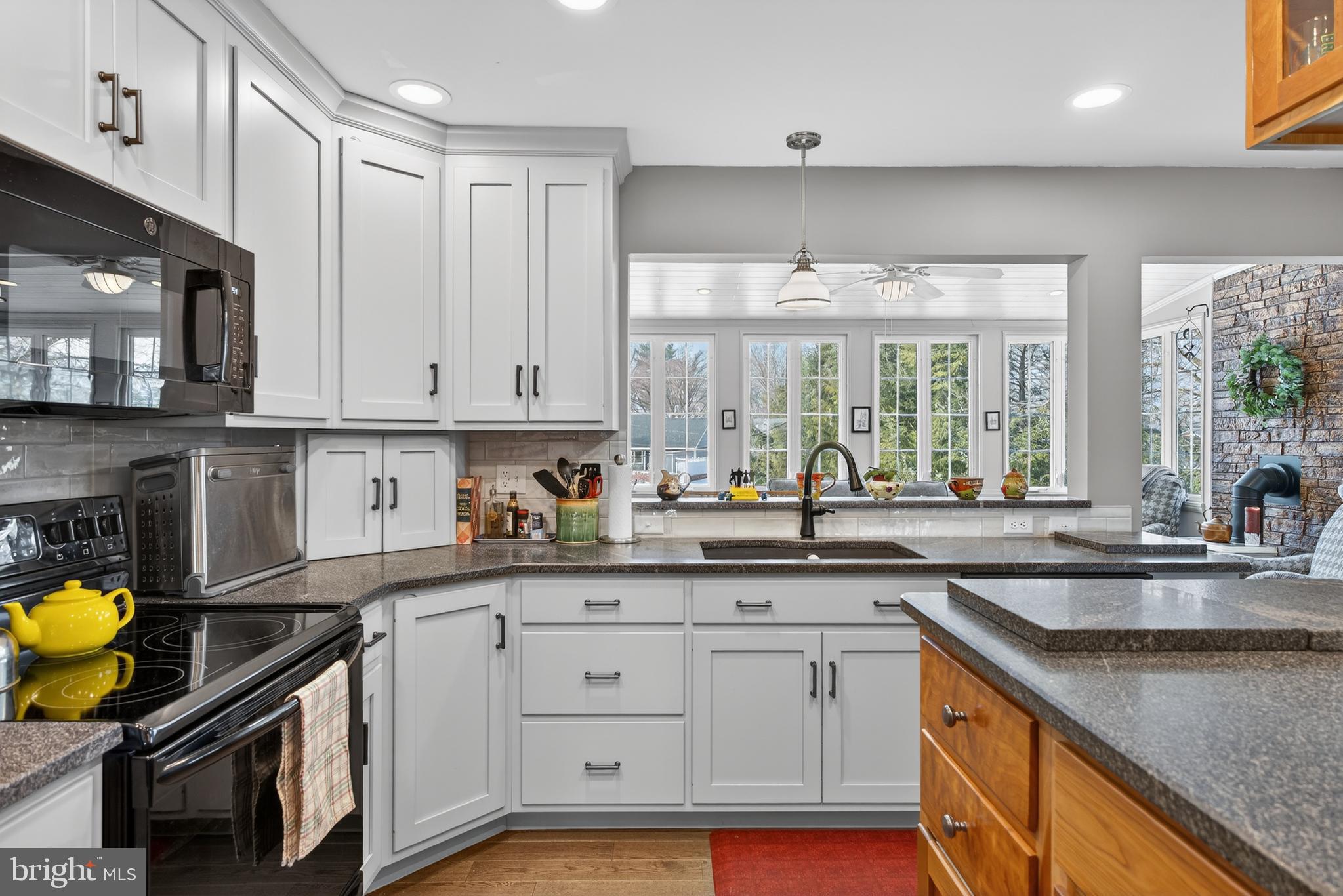 146 South Oak Street Lititz, PA 17543 - Photo 13 of 55 a kitchen with a sink stove and cabinets