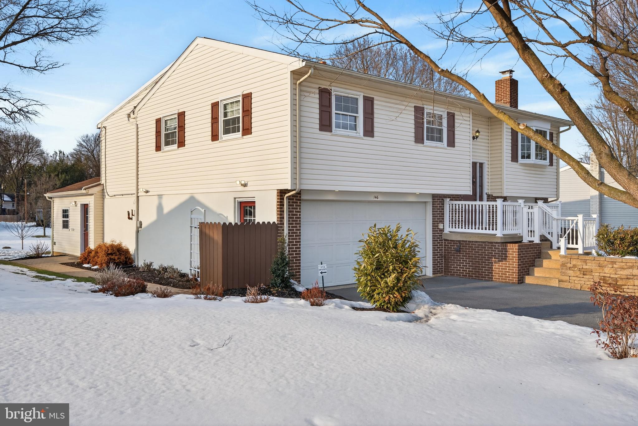 146 South Oak Street Lititz, PA 17543 - Photo 2 of 55 a front view of a house with a yard and garage