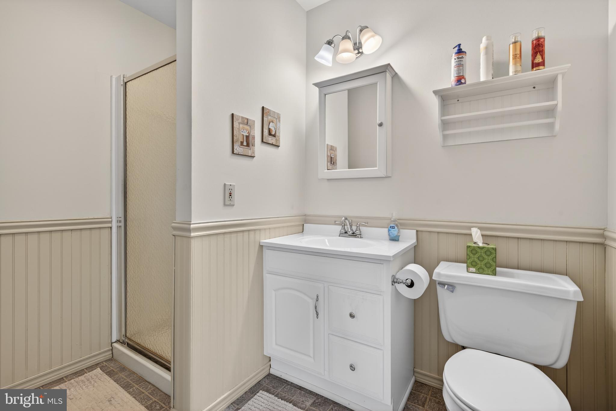 146 South Oak Street Lititz, PA 17543 - Photo 23 of 55 a bathroom with a toilet sink and mirror