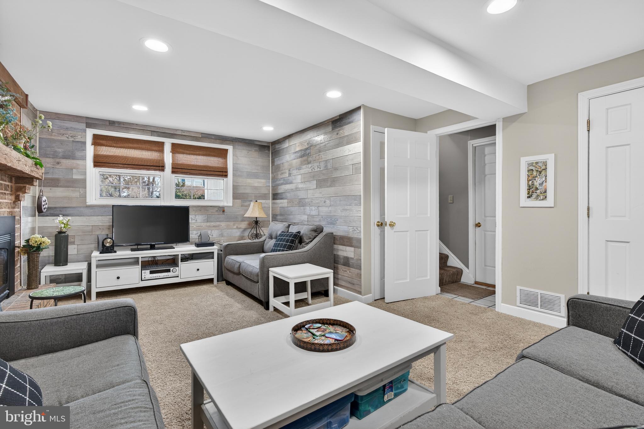 146 South Oak Street Lititz, PA 17543 - Photo 33 of 55 a living room with furniture and a flat screen tv