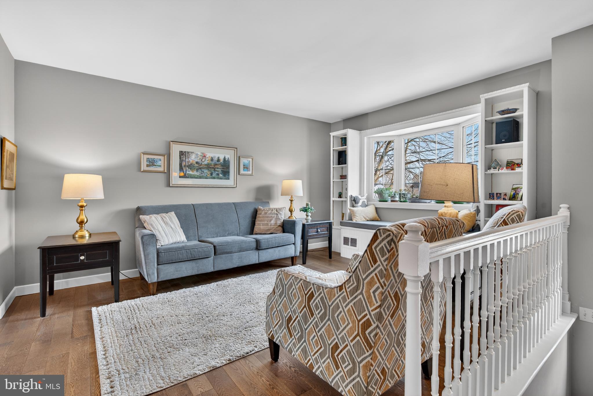 146 South Oak Street Lititz, PA 17543 - Photo 6 of 55 a living room with furniture and a lamp with wooden floor