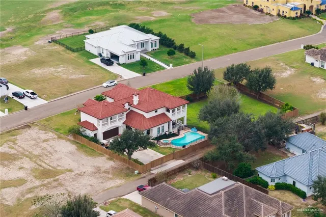 an aerial view of a house with a garden