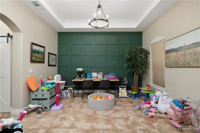 a living room with furniture and toys
