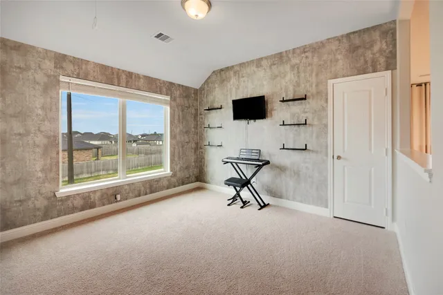 a view of a livingroom with a flat screen tv