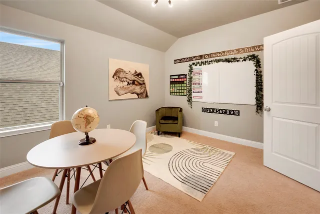 a workspace with furniture and window