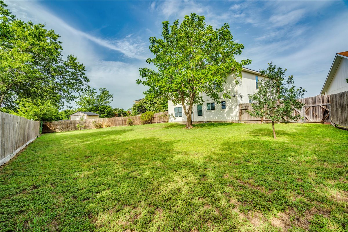 618 Lavaca Loop Elgin, TX 78621 - Photo 27 of 30 View of fenced backyard