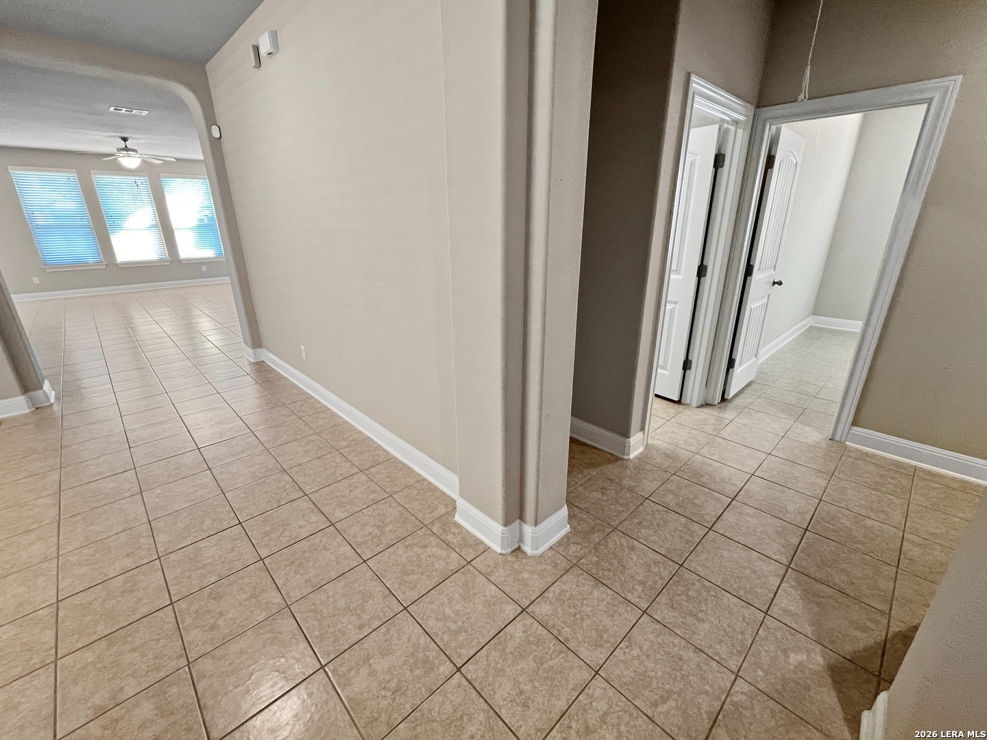 8626 Jogeva Rise San Antonio, TX 78251 - Photo 11 of 44 a view of a livingroom with an empty space and a fireplace
