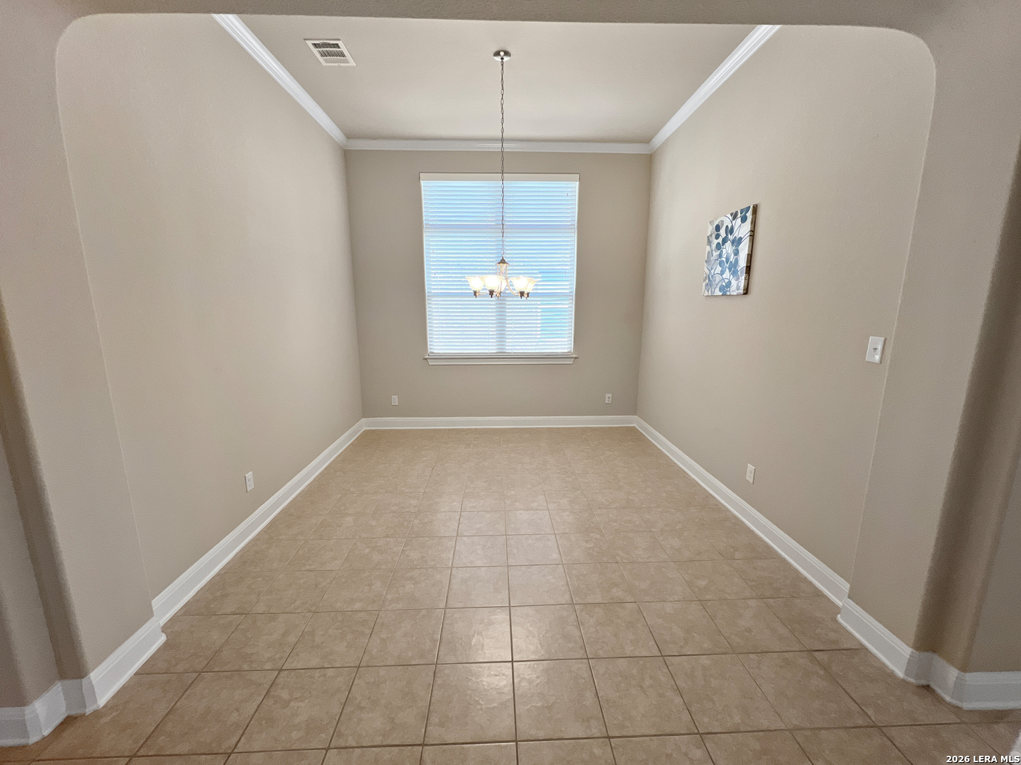 8626 Jogeva Rise San Antonio, TX 78251 - Photo 15 of 44 an empty room with windows and cabinet