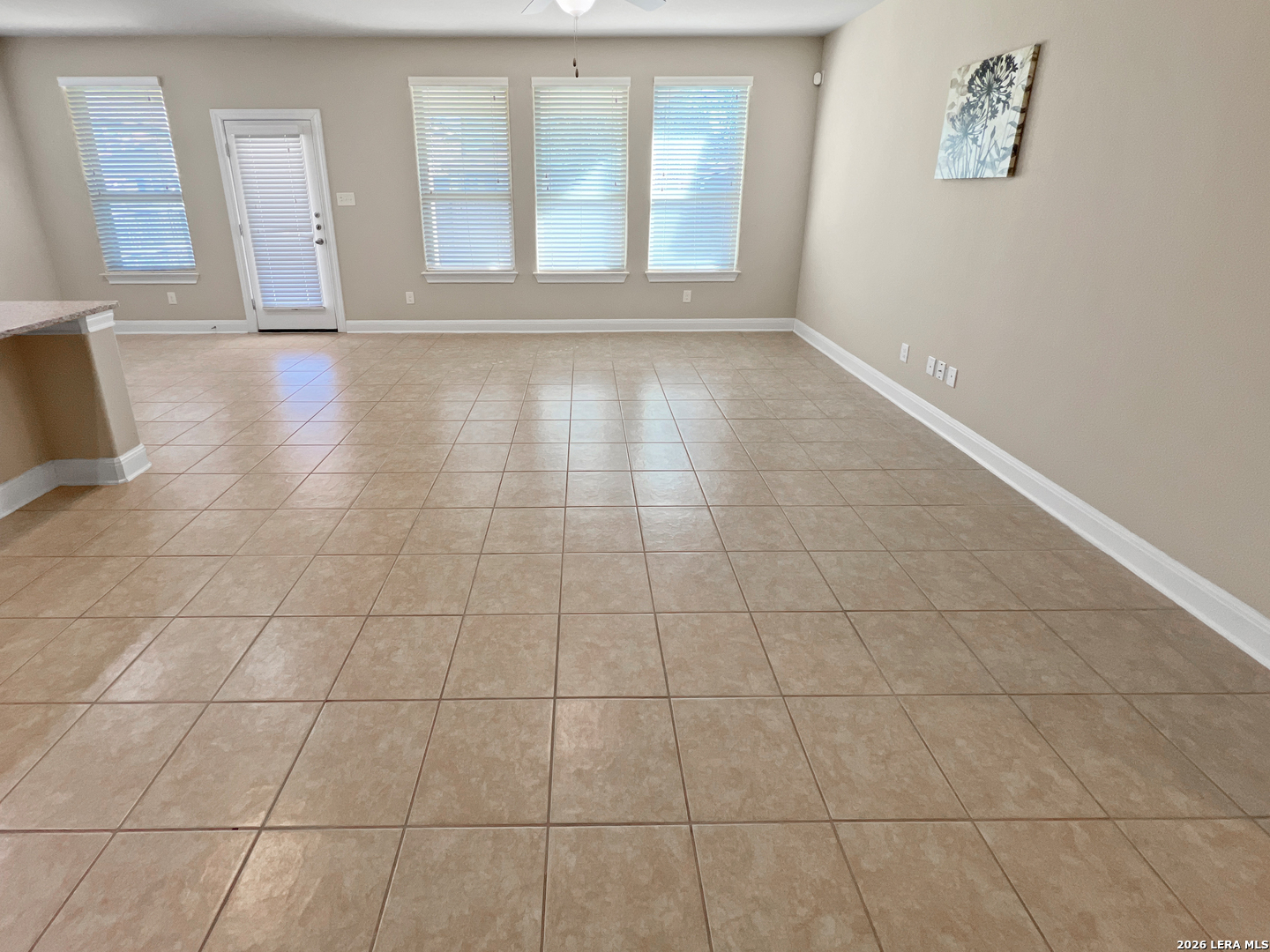 8626 Jogeva Rise San Antonio, TX 78251 - Photo 18 of 44 a view of an empty room with a window