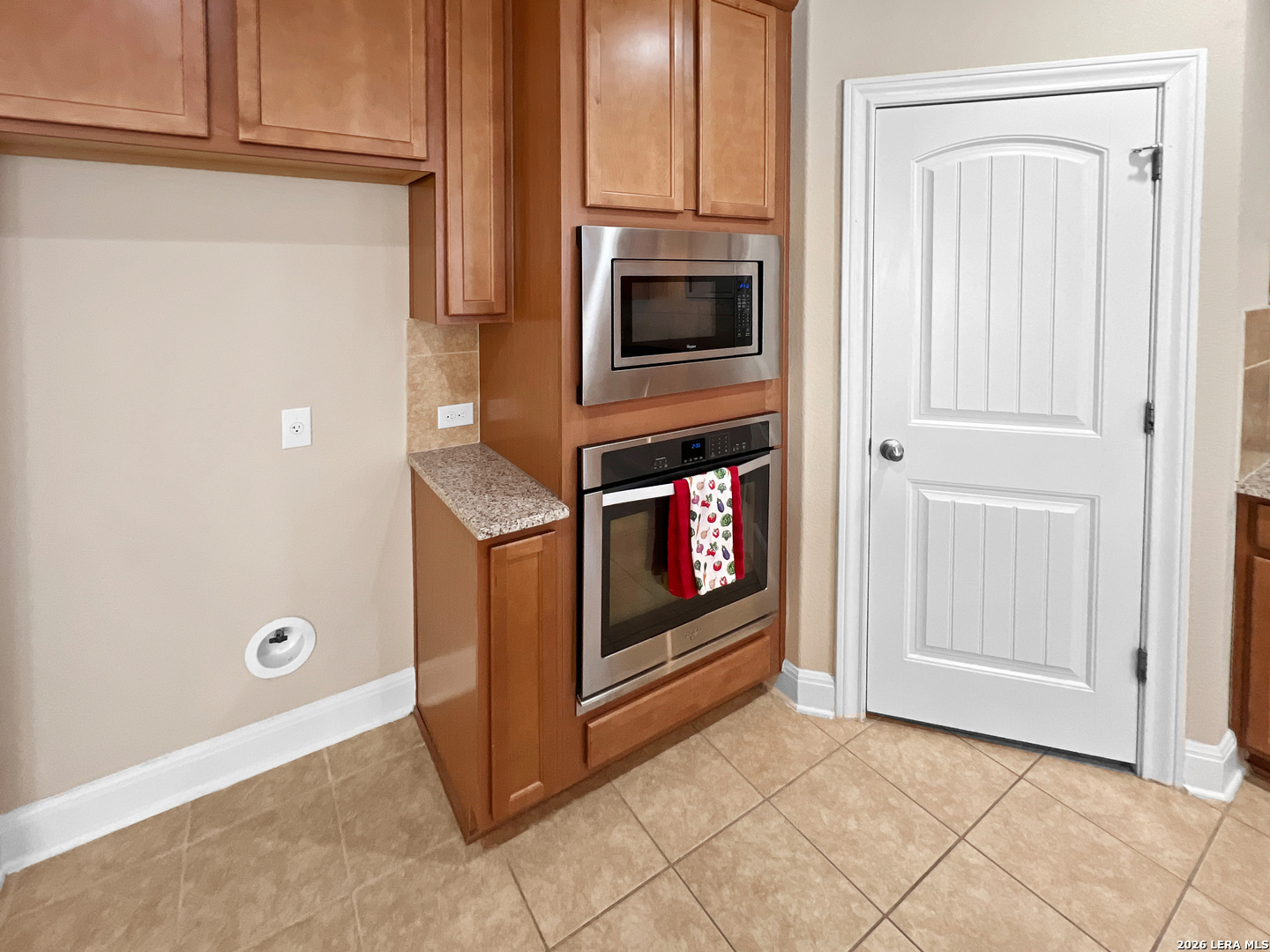 8626 Jogeva Rise San Antonio, TX 78251 - Photo 21 of 44 a view of an empty room with a fireplace