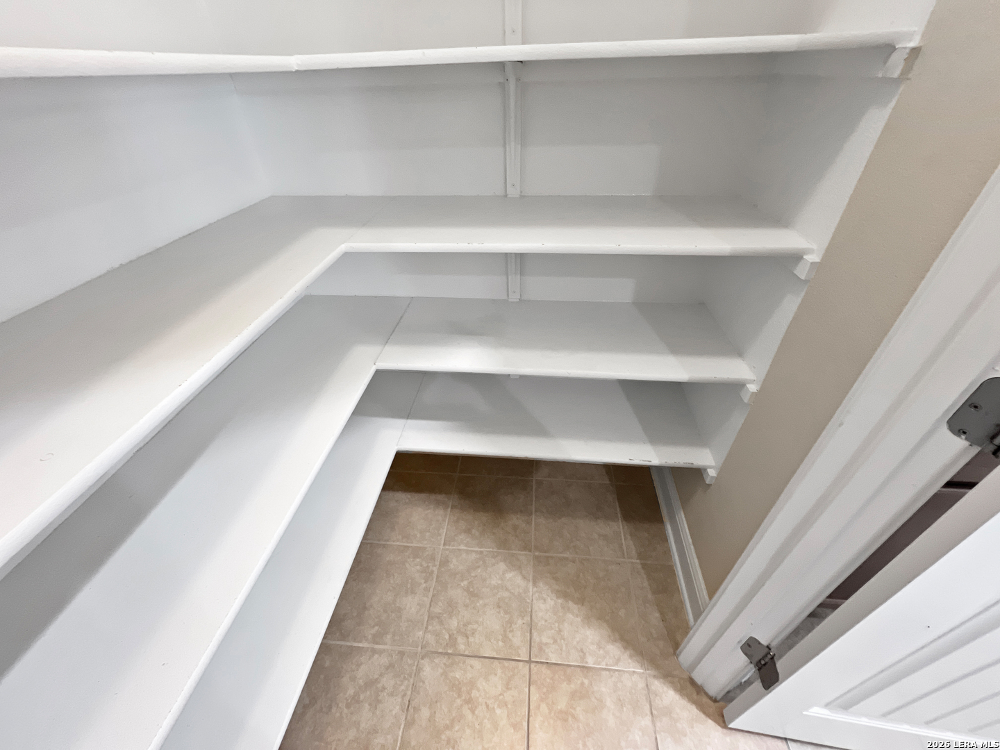 8626 Jogeva Rise San Antonio, TX 78251 - Photo 22 of 44 a view of a room with rack on the wall