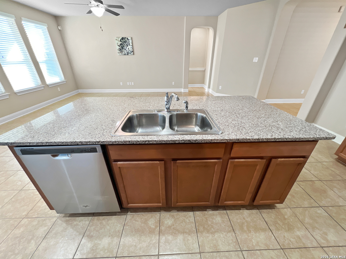 8626 Jogeva Rise San Antonio, TX 78251 - Photo 26 of 44 a bathroom with a granite countertop sink and mirror