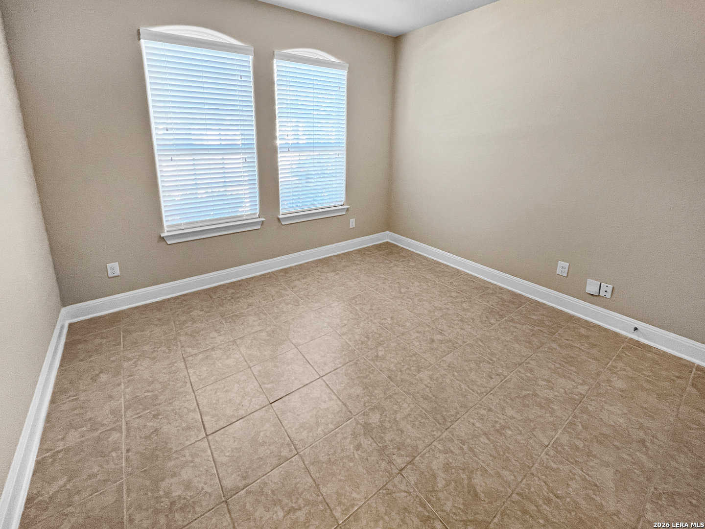8626 Jogeva Rise San Antonio, TX 78251 - Photo 3 of 44 an empty room with windows