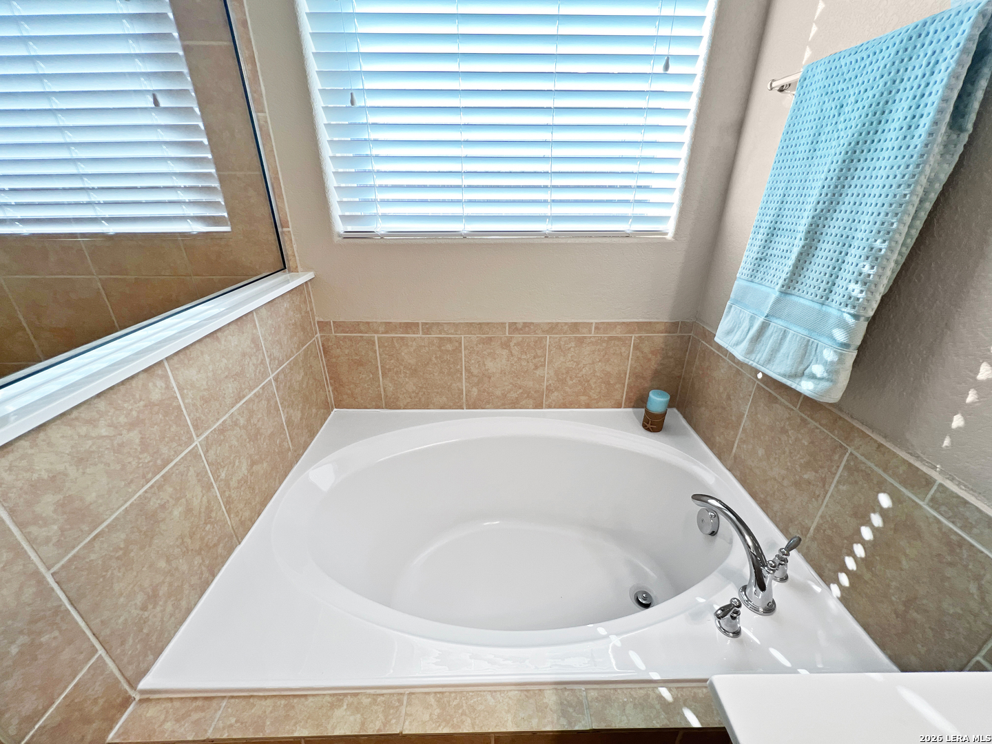 8626 Jogeva Rise San Antonio, TX 78251 - Photo 35 of 44 a bathroom with a bathtub