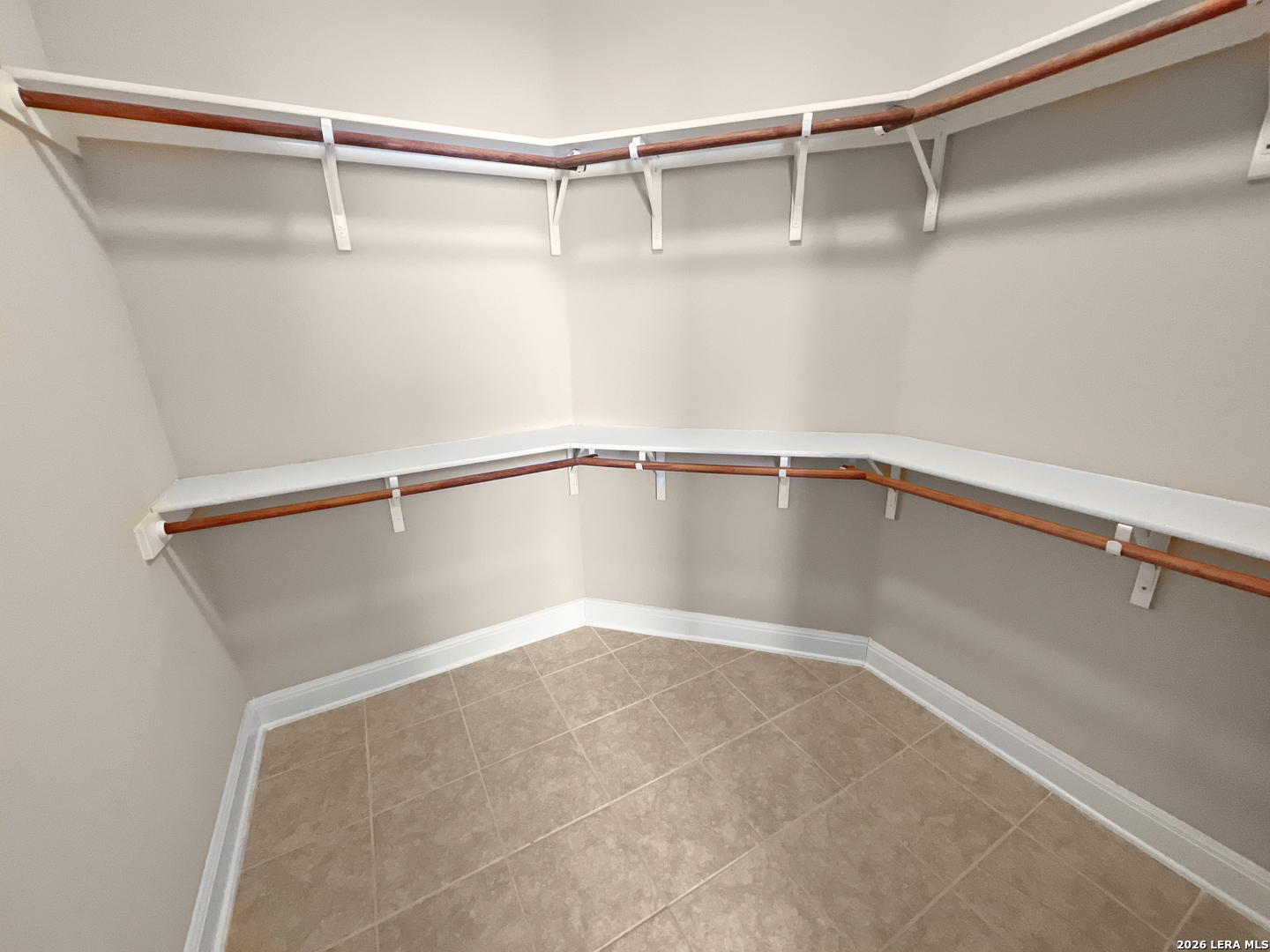 8626 Jogeva Rise San Antonio, TX 78251 - Photo 40 of 44 a view of a room with racks on the wall