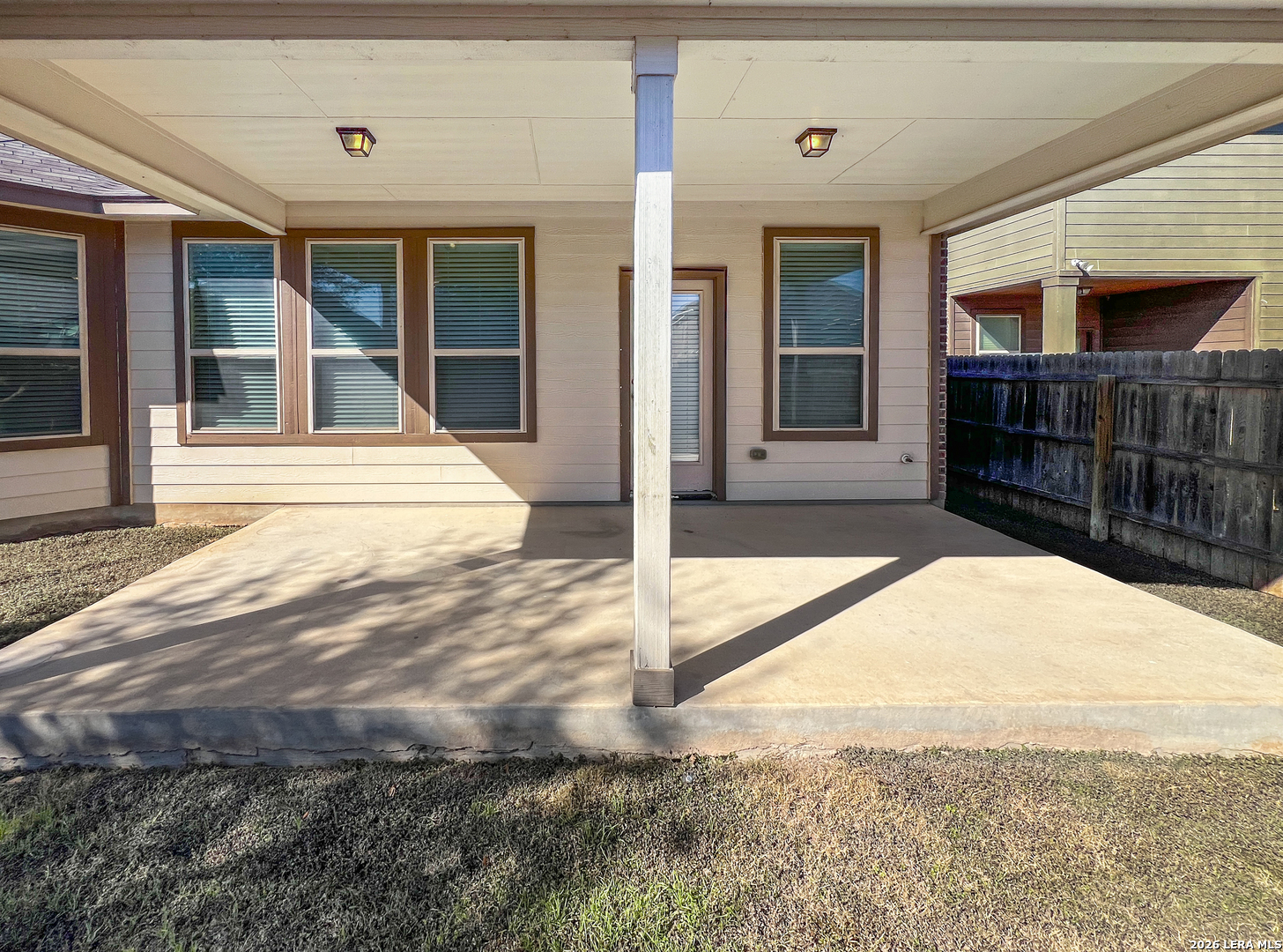 8626 Jogeva Rise San Antonio, TX 78251 - Photo 42 of 44 a view of house with backyard and glass windows
