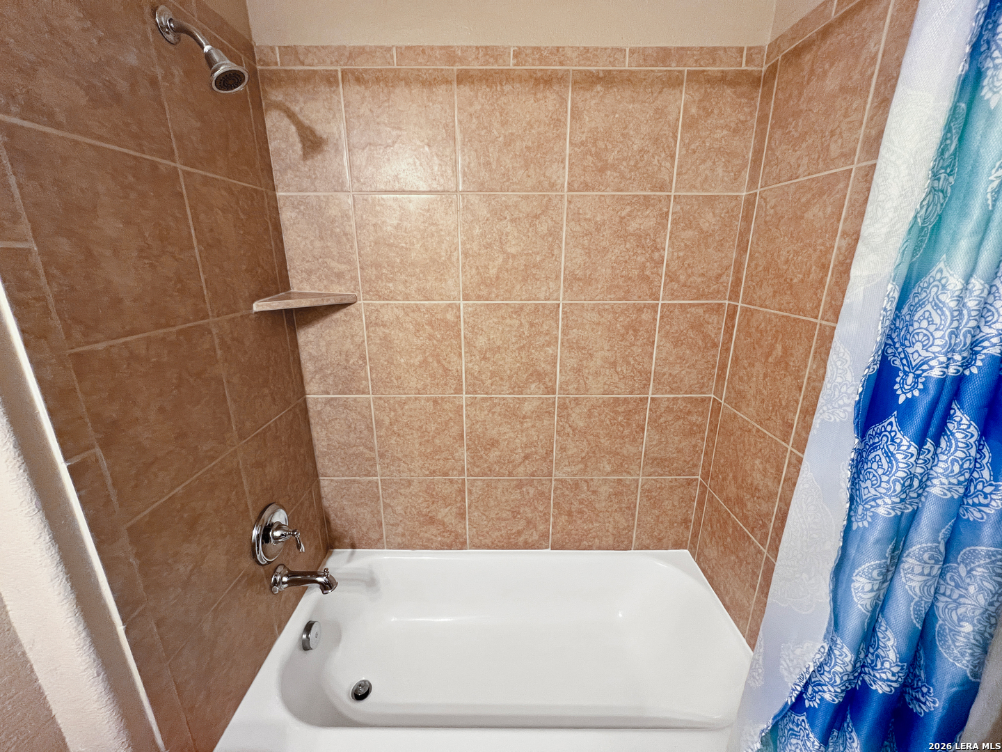 8626 Jogeva Rise San Antonio, TX 78251 - Photo 6 of 44 a bathroom with a bathtub