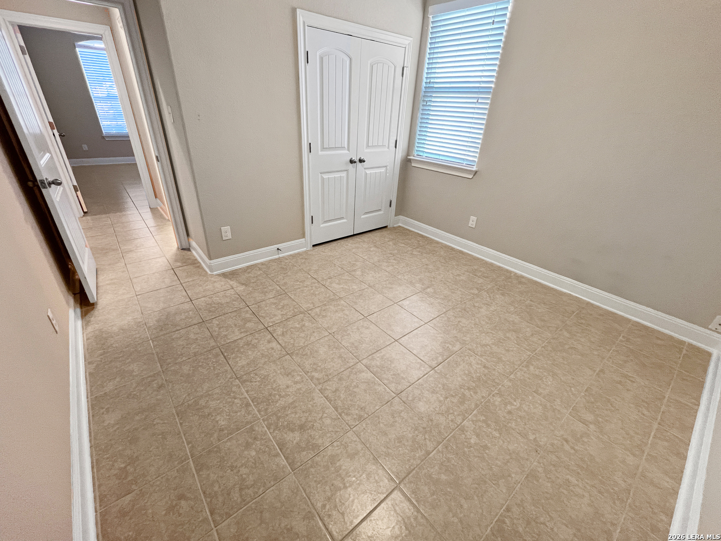 8626 Jogeva Rise San Antonio, TX 78251 - Photo 9 of 44 an empty room with windows