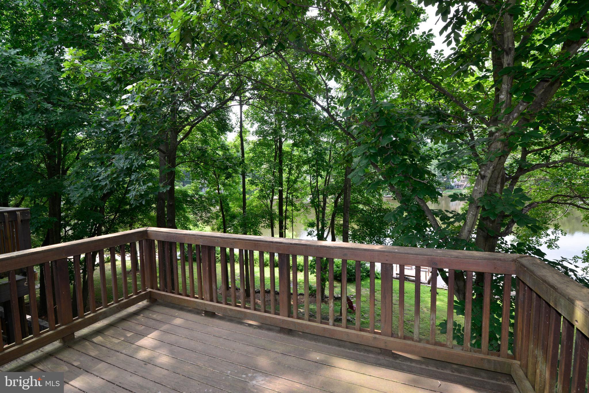 2268 Cedar Cove Court Reston, VA 20191 - Photo 18 of 41 A view of the owner's suite deck and lake.