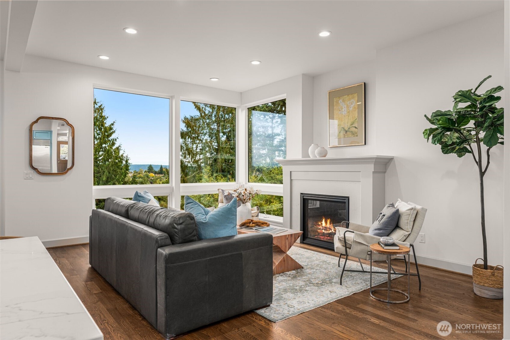6032 50th Avenue Northeast Seattle, WA 98115 - Photo 12 of 40 a living room with furniture and a fireplace