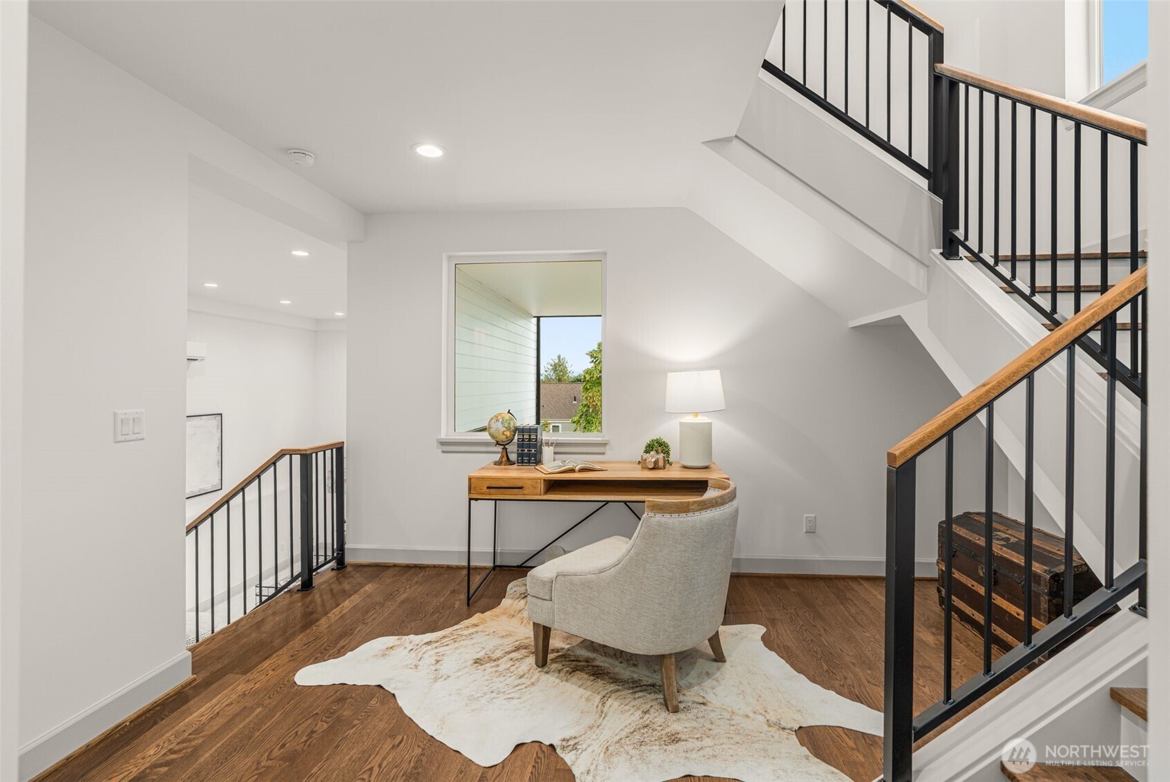 6032 50th Avenue Northeast Seattle, WA 98115 - Photo 15 of 40 a workspace with wooden floor and furniture