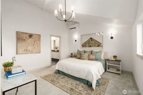 a bathroom with a granite countertop sink mirror and bathtub