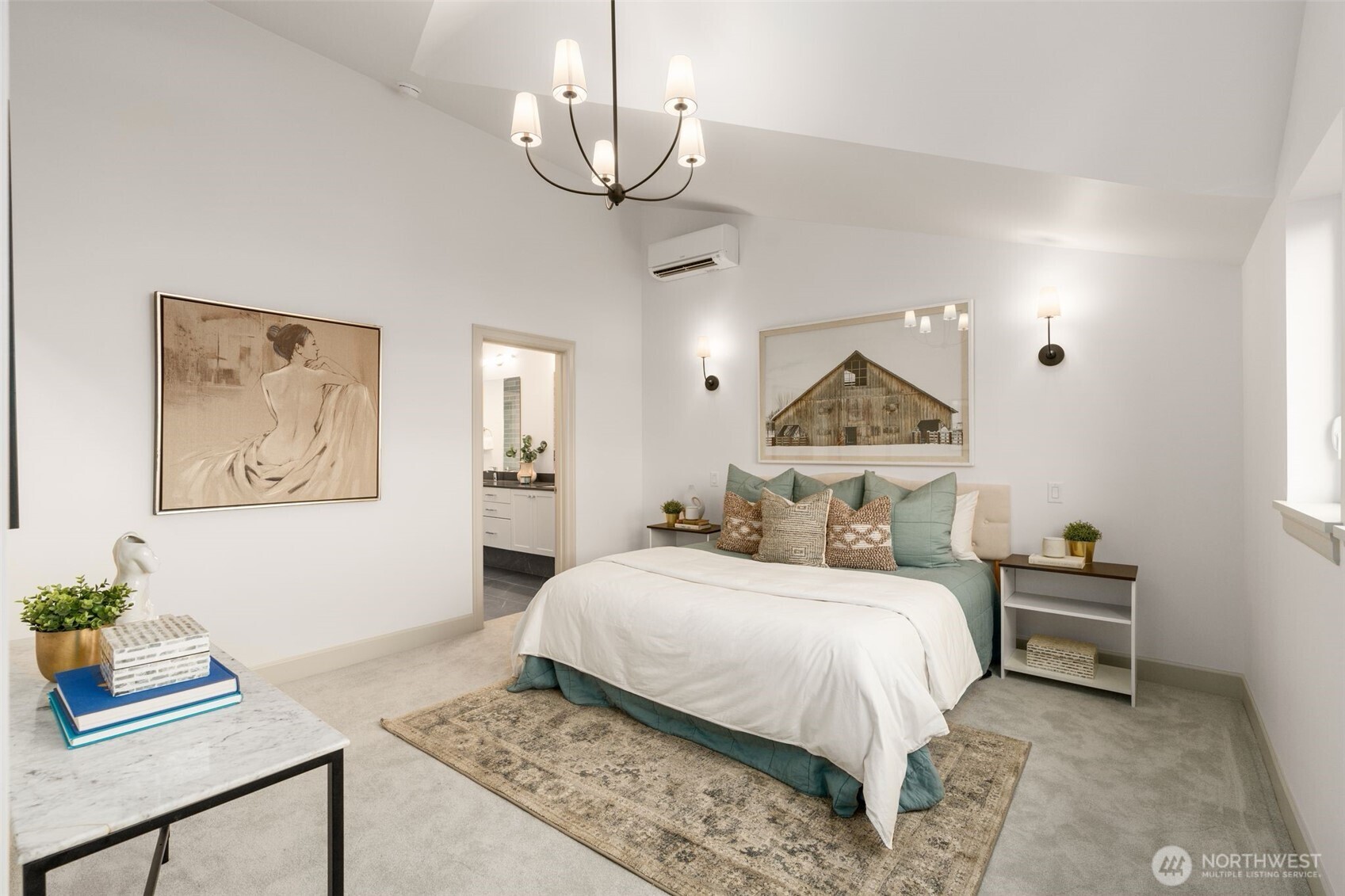 6032 50th Avenue Northeast Seattle, WA 98115 - Photo 18 of 40 a bedroom with a bed and a chandelier