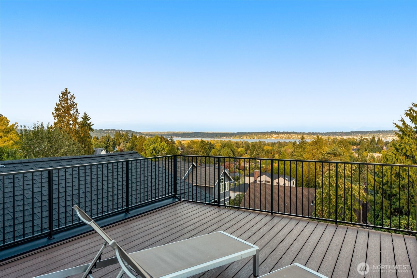 6032 50th Avenue Northeast Seattle, WA 98115 - Photo 24 of 40 a view of a roof deck with wooden floor and fence