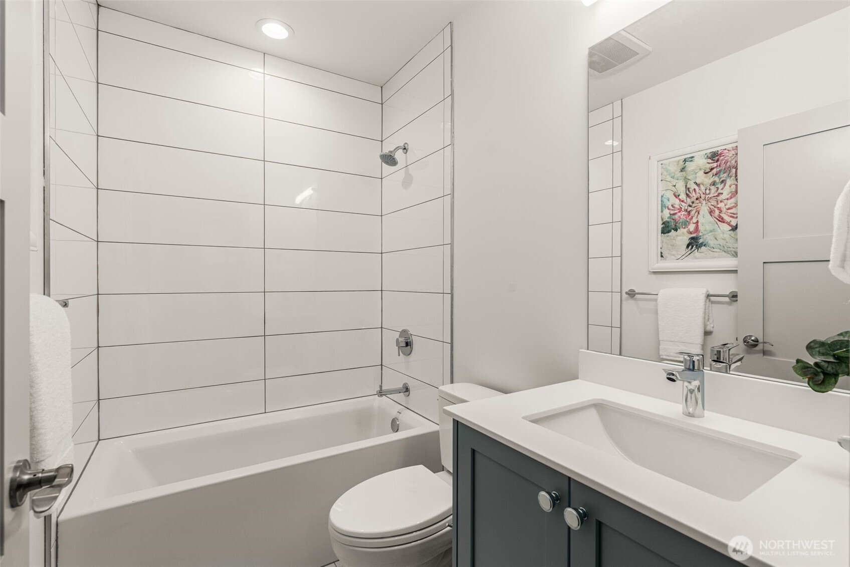 6032 50th Avenue Northeast Seattle, WA 98115 - Photo 30 of 40 a bathroom with a sink a toilet and shower