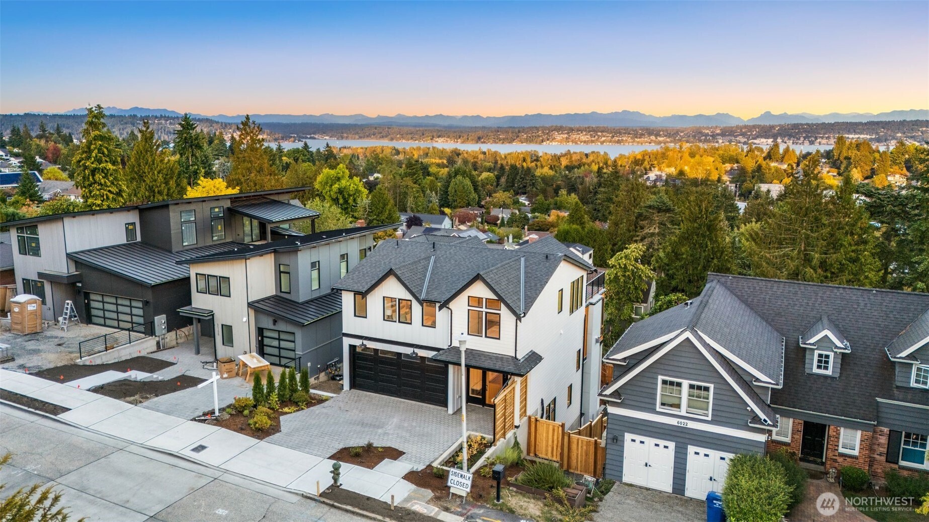 6032 50th Avenue Northeast Seattle, WA 98115 - Photo 33 of 40 a view of multiple houses with a city view