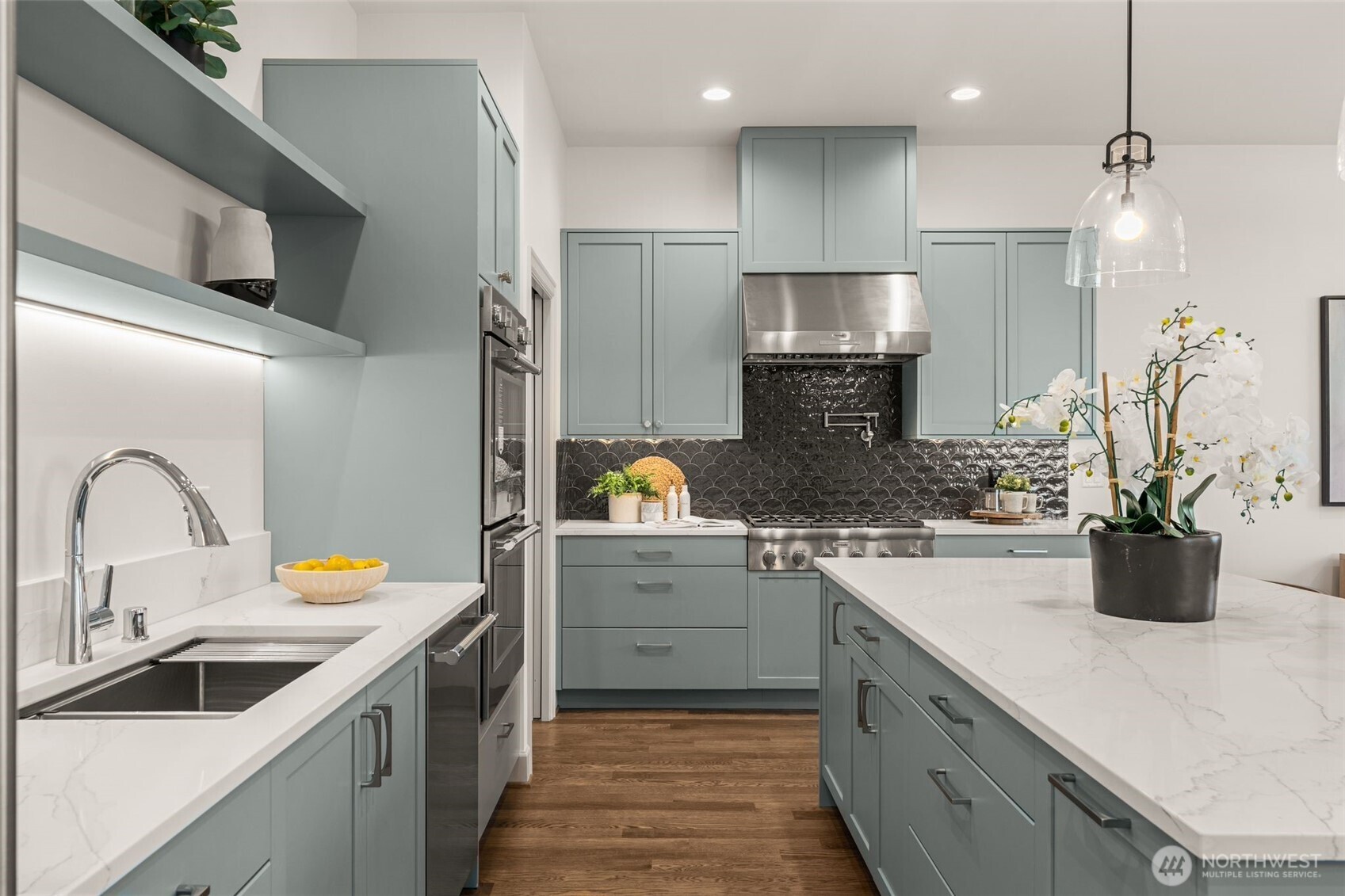 6032 50th Avenue Northeast Seattle, WA 98115 - Photo 7 of 40 a kitchen with a sink and refrigerator