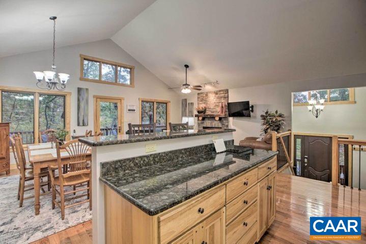 280 Fawn Ridge Drive Roseland, VA 22967 - Photo 4 of 23 a kitchen with stainless steel appliances granite countertop a stove and a sink