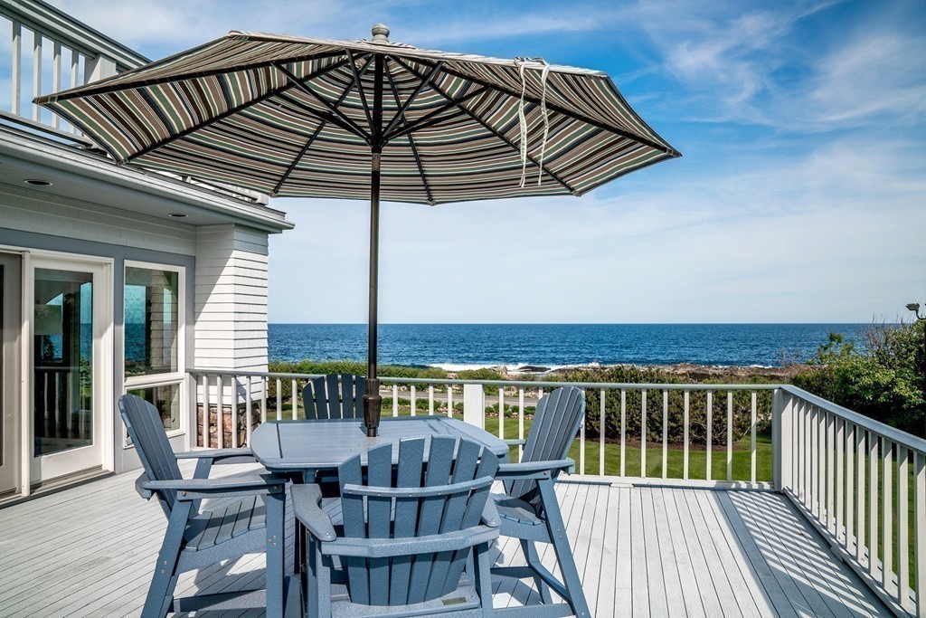 139-138 Atlantic Road Gloucester, MA 01930 - Photo 12 of 28 a view of balcony with furniture and wooden floor