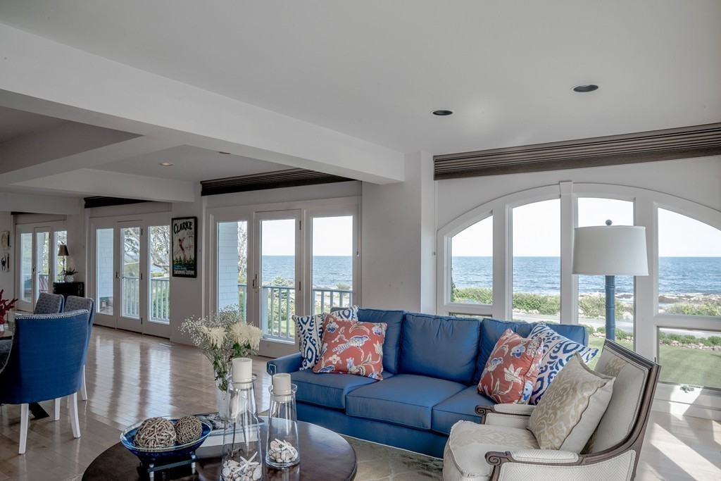 139-138 Atlantic Road Gloucester, MA 01930 - Photo 13 of 28 a living room with furniture and floor to ceiling windows