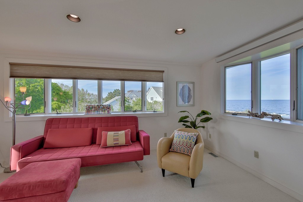 139-138 Atlantic Road Gloucester, MA 01930 - Photo 18 of 28 a living room with furniture and a large window