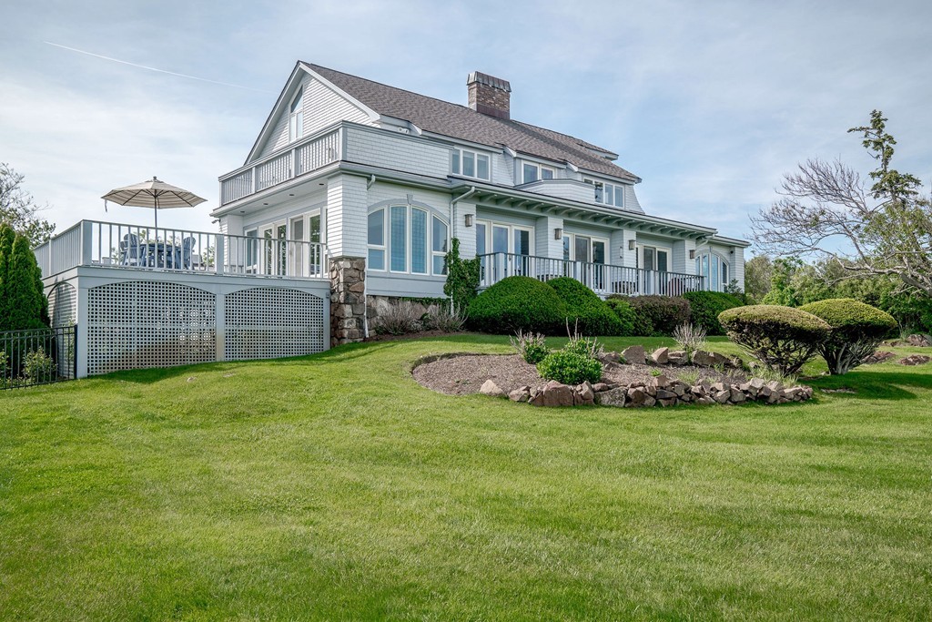 139-138 Atlantic Road Gloucester, MA 01930 - Photo 2 of 28 a view of a house with a garden and plants