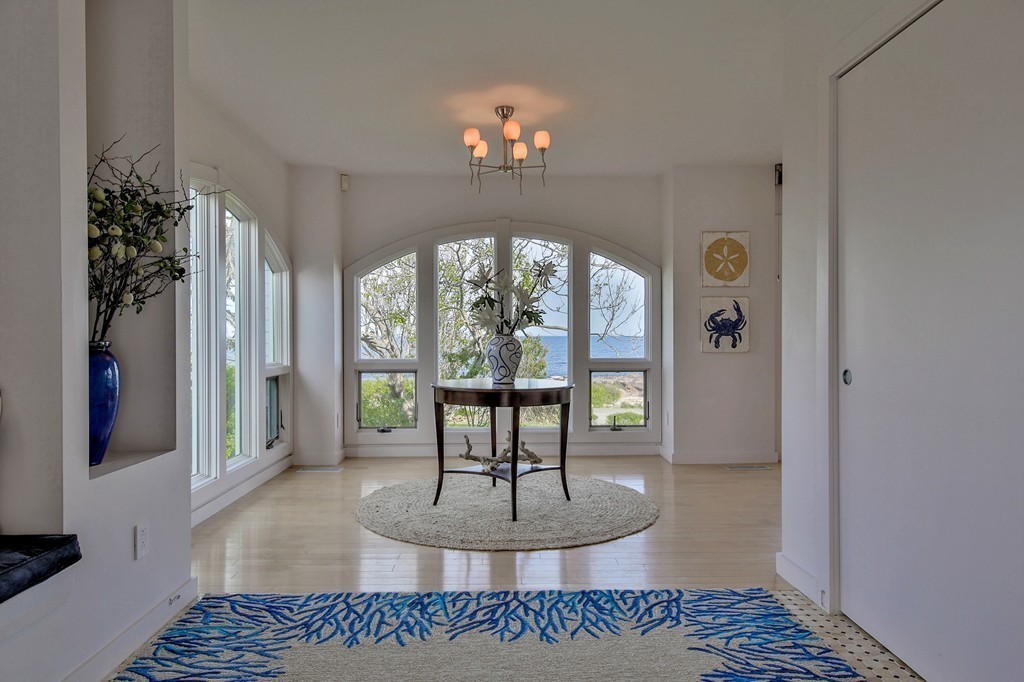 139-138 Atlantic Road Gloucester, MA 01930 - Photo 7 of 28 a view of a livingroom with furniture window and wooden floor