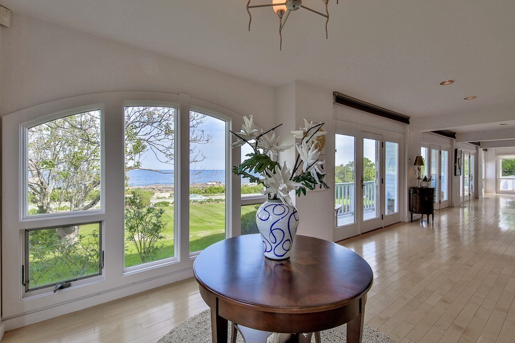139-138 Atlantic Road Gloucester, MA 01930 - Photo 8 of 28 a living room with furniture and a potted plant