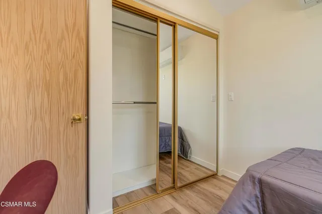 a view of a room with rack on the wall