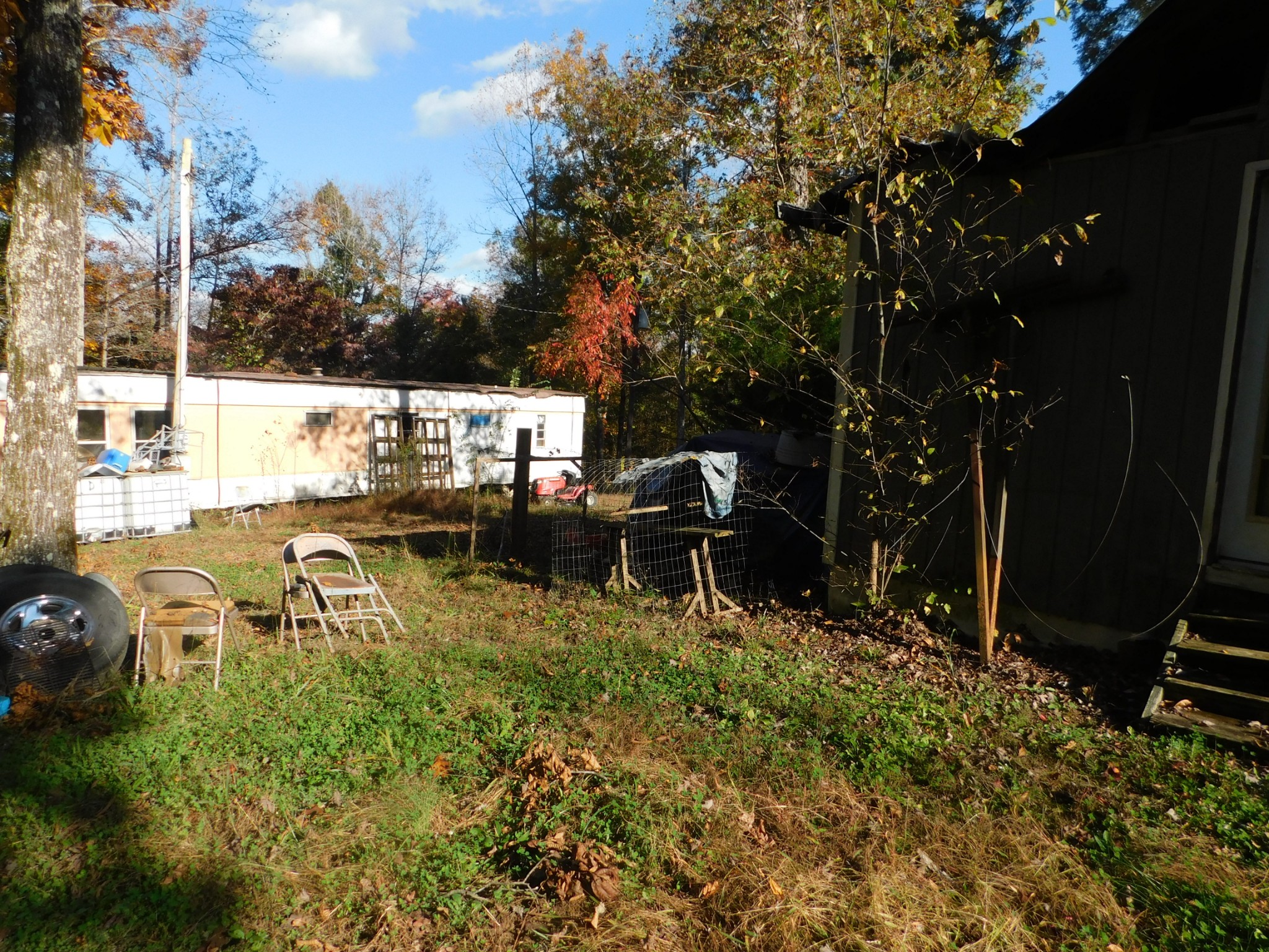 1869 Gander Branch Road Waverly, TN 37185 - Photo 23 of 46 a view of a backyard with sitting area