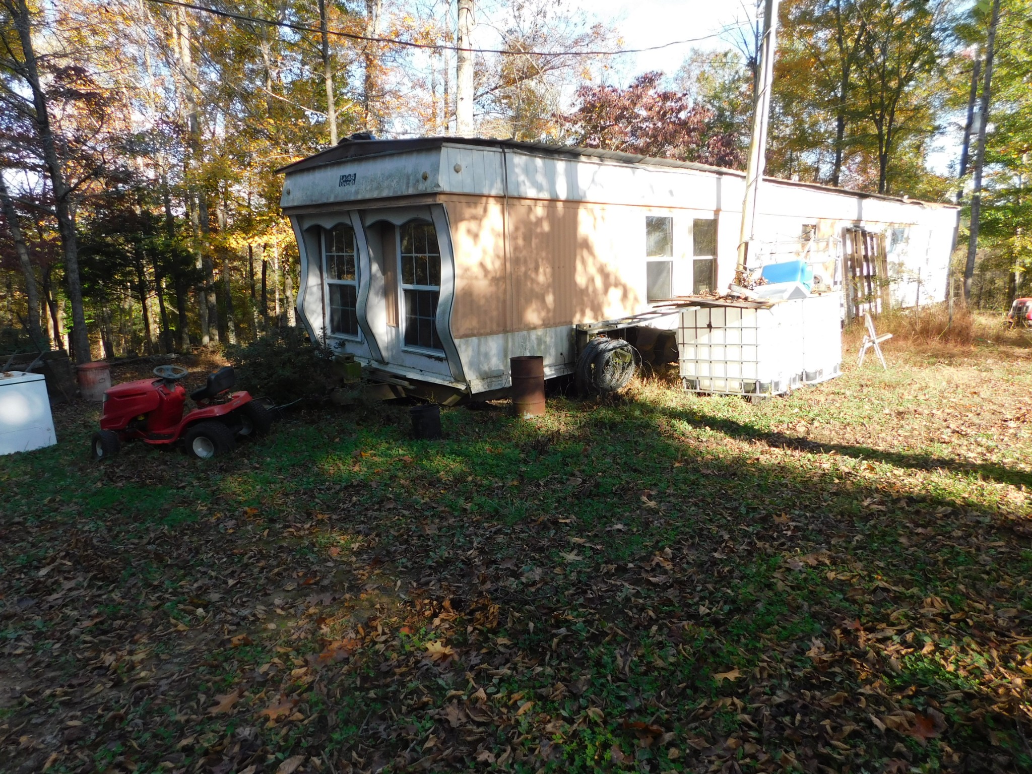 1869 Gander Branch Road Waverly, TN 37185 - Photo 27 of 46 a backyard of a house with lots of green space
