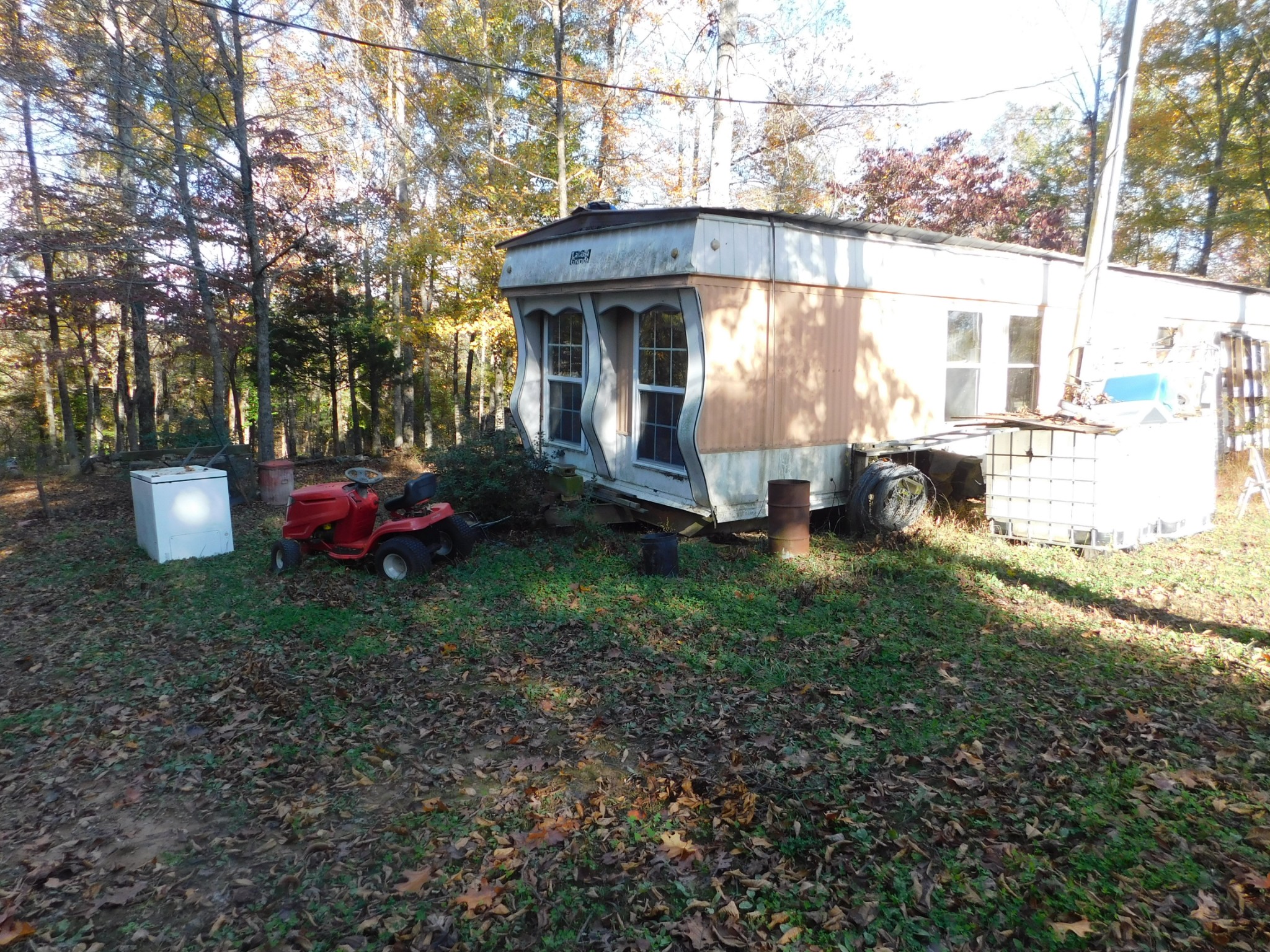 1869 Gander Branch Road Waverly, TN 37185 - Photo 28 of 46 a view of a house with backyard and garden