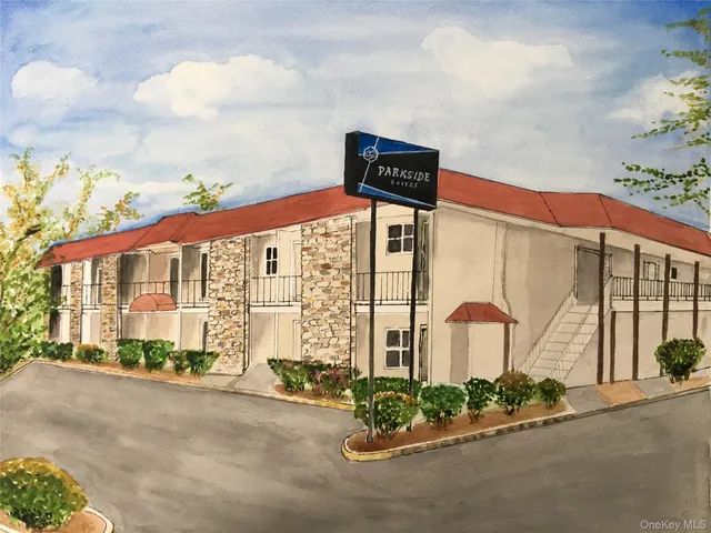 a front view of a building with street view