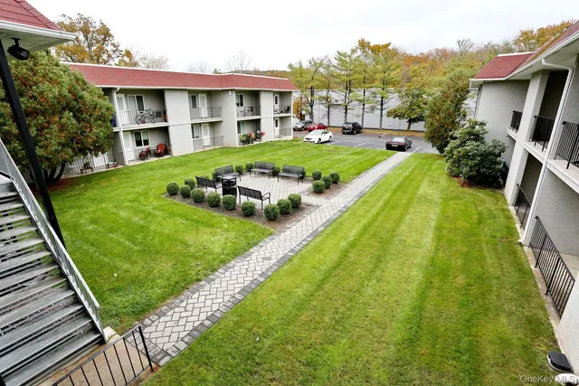 a view of a house with a yard patio and a patio