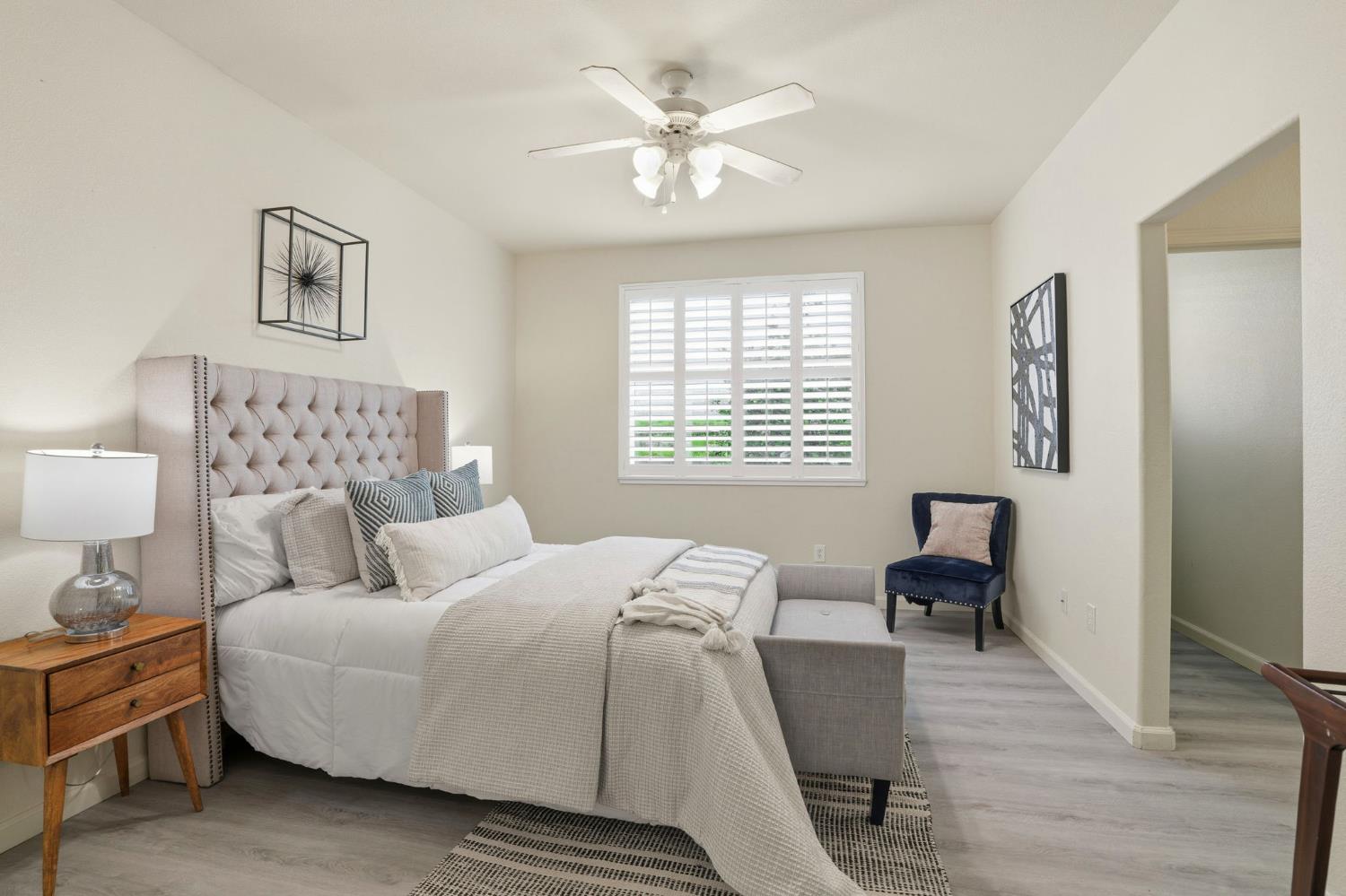 10250 Rudder Way Stockton, CA 95209 - Photo 24 of 46 a bedroom with a bed and a table with chair