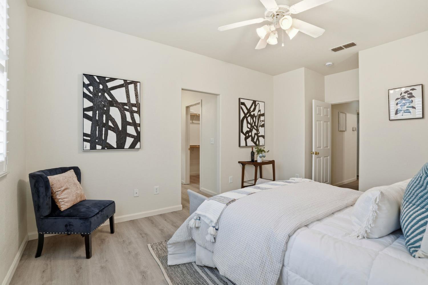 10250 Rudder Way Stockton, CA 95209 - Photo 25 of 46 a bedroom with a bed and a chair