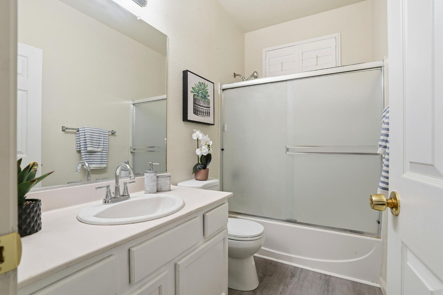 10250 Rudder Way Stockton, CA 95209 - Photo 28 of 46 a bathroom with a sink toilet and shower