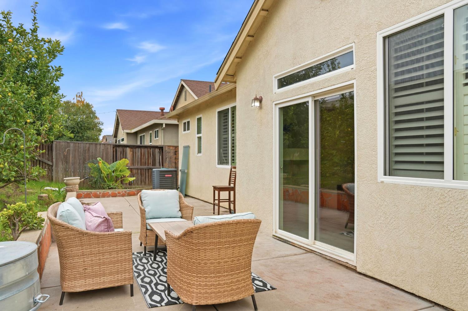 10250 Rudder Way Stockton, CA 95209 - Photo 33 of 46 a view of a patio with a table and chairs