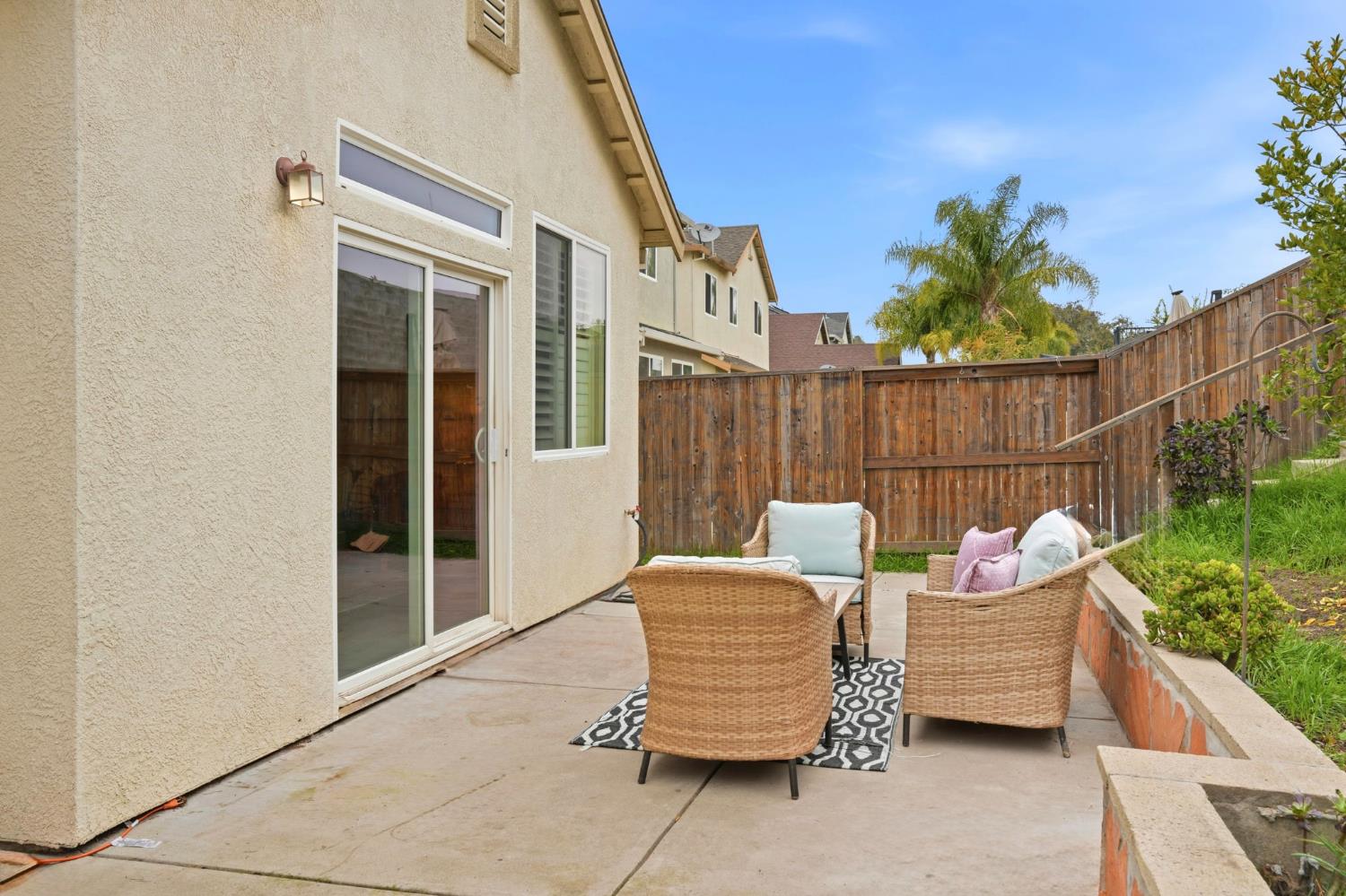 10250 Rudder Way Stockton, CA 95209 - Photo 34 of 46 a backyard of a house with barbeque oven and potted plants