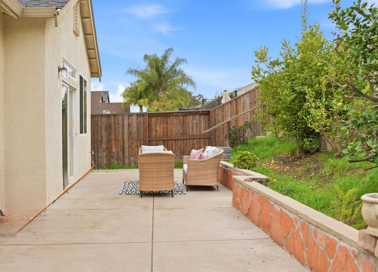 10250 Rudder Way Stockton, CA 95209 - Photo 35 of 46 a view of a patio with couches and potted plants